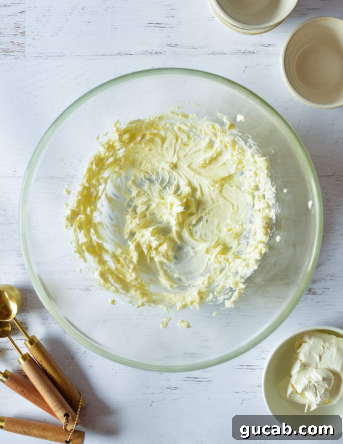A bowl of whipped, light, and creamy butter after being beaten.