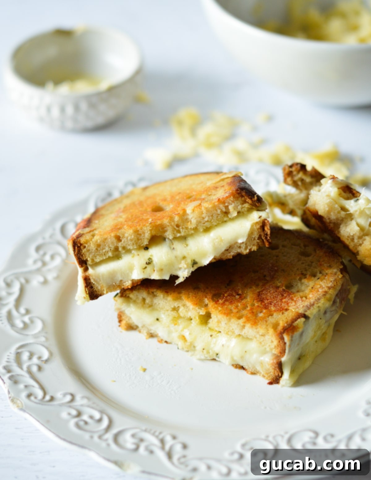 Gourmet Provolone Grilled Cheese 10 grilled cheese halves on top of each other.