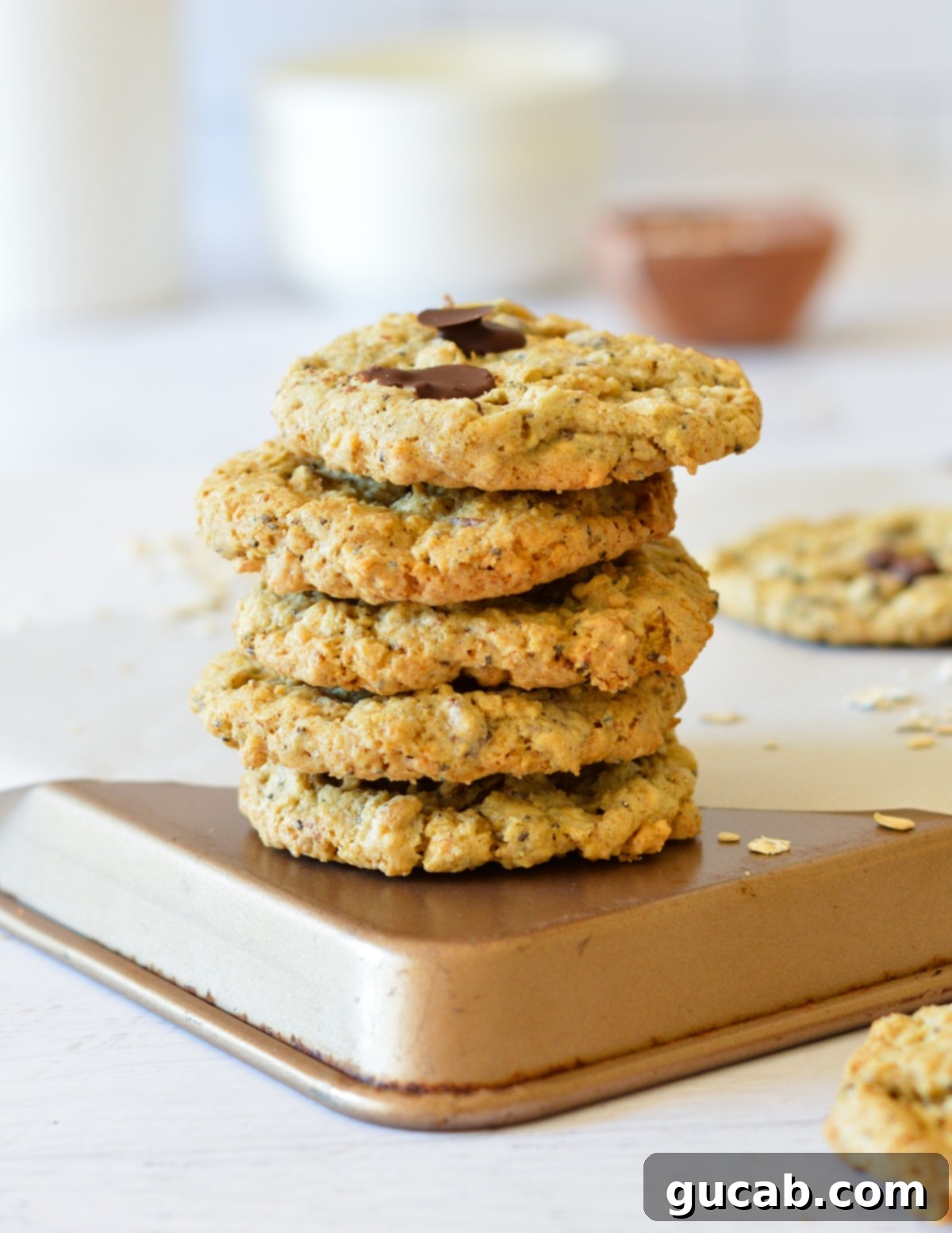 Wholesome Fiber Cookies 2 A stack of perfectly baked oatmeal cookies, showcasing their chewy texture and wholesome ingredients.