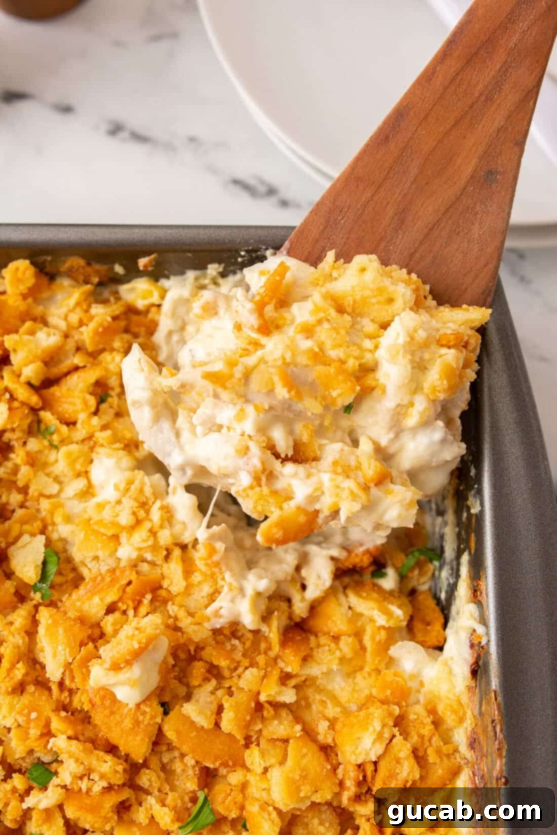 a scoop of chicken casserole 