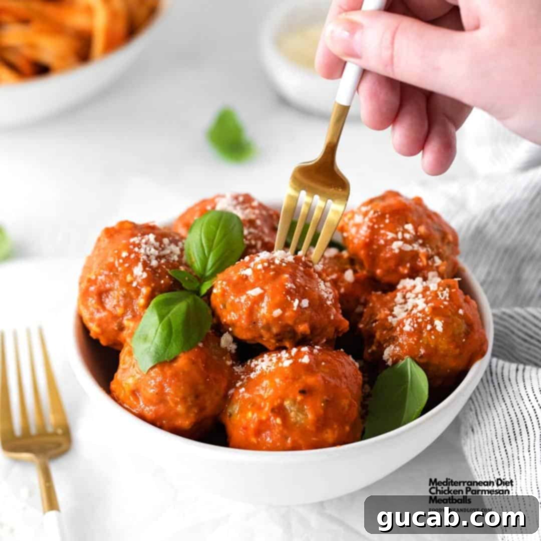 a fork of parmesan meatballs 