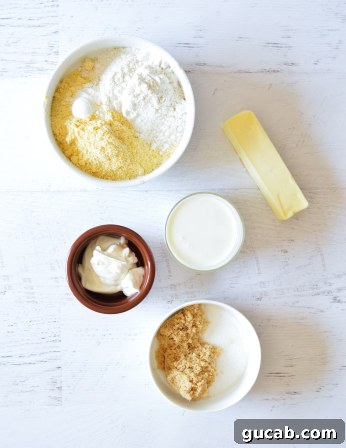 cornmeal, flour, butter, sour cream, buttermilk, sugar, and brown sugar. 