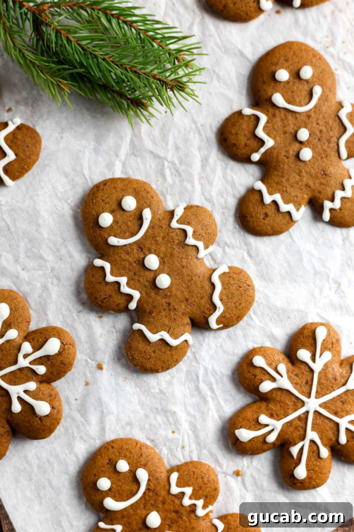 Festive gluten-free gingerbread cookies, decorated for the holidays.