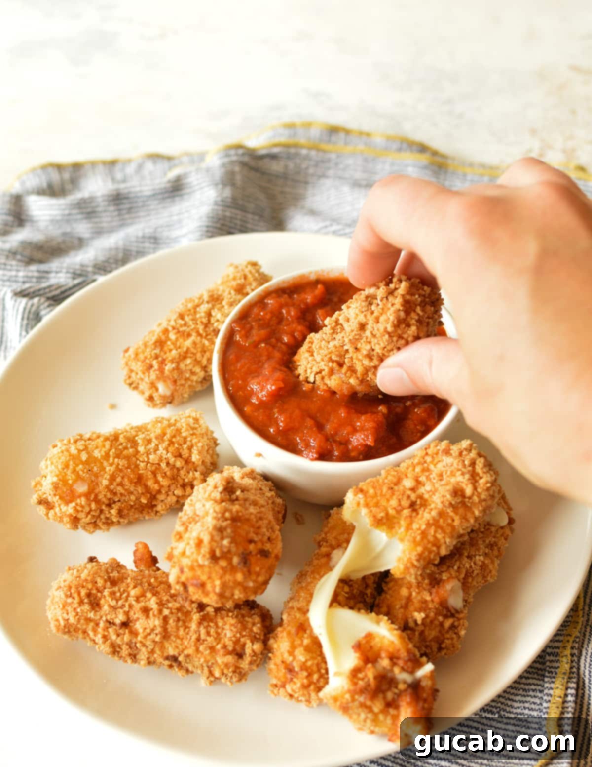Irresistible Gluten-Free Mozzarella Sticks 12 gluten free mozzarella sticks with marinara