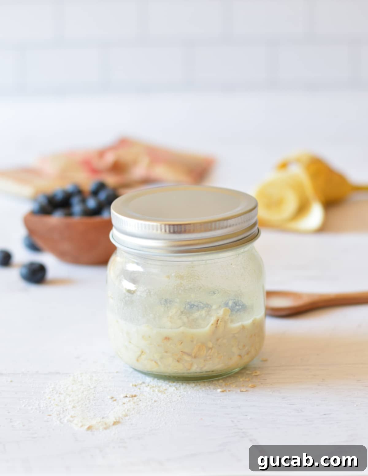 A sealed jar of instant overnight oats, ready for refrigeration, promising a quick and delicious breakfast later.