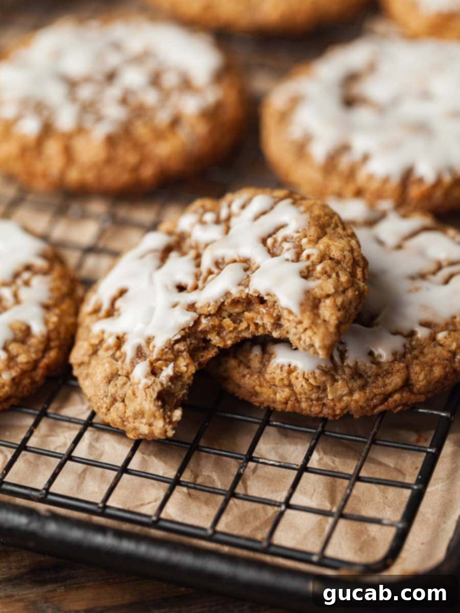 21 Heavenly Gluten-Free Cookies 17 iced oatmeal cookies on a wire rack.