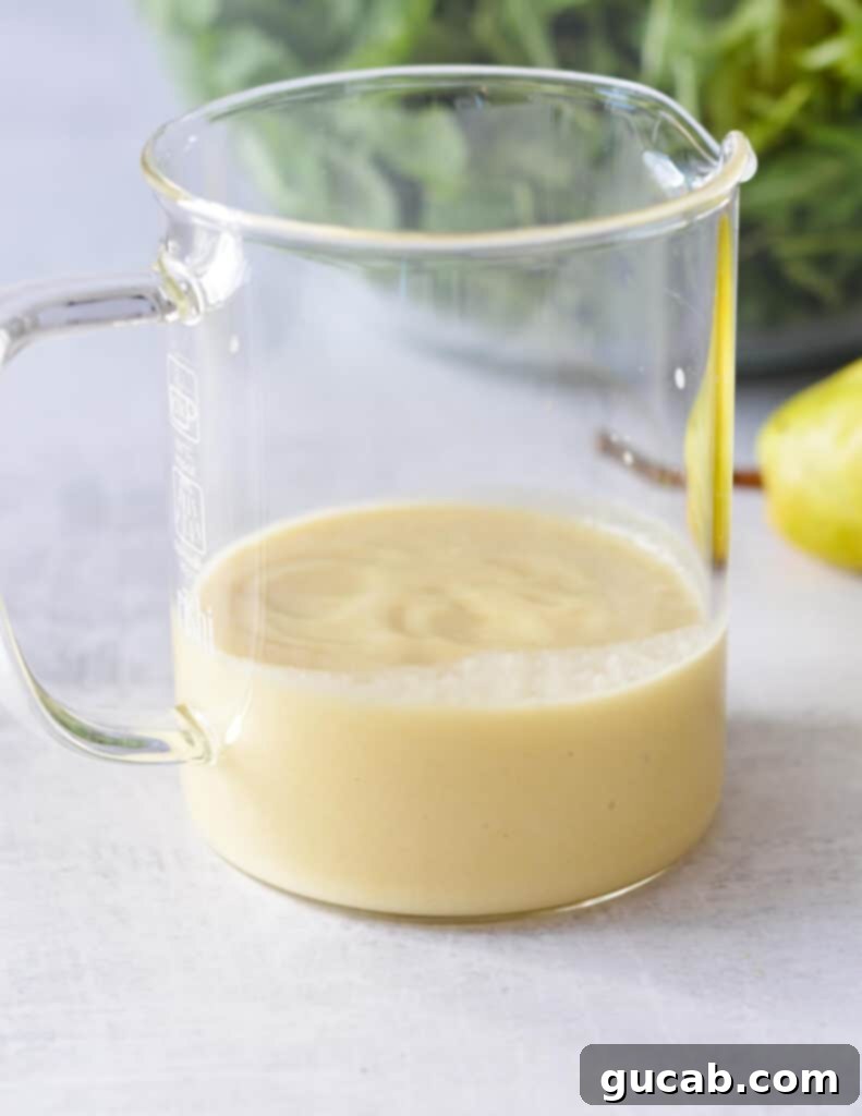 pear vinaigrette in glass cup.
