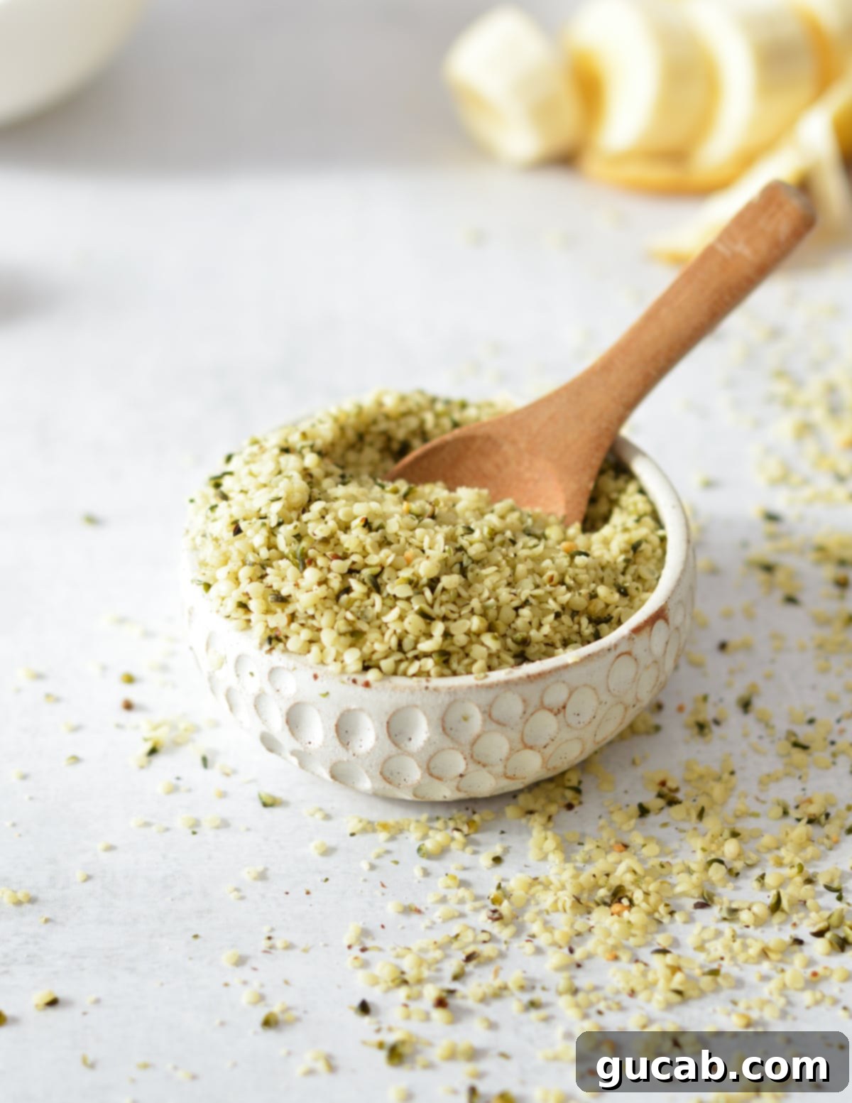 Elevate Your Salad: 35+ Creative Crunchy Toppings 7 a small bowl of hemp seeds.