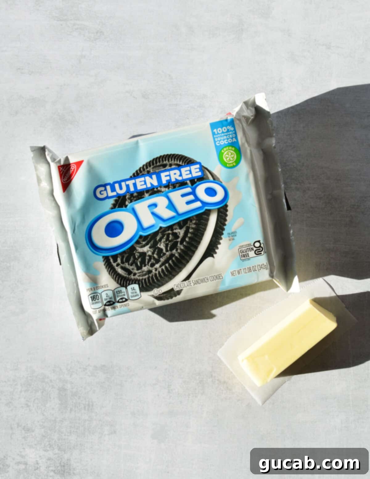 The Ultimate Gluten-Free Oreo Pie Crust 3 package of gluten free oreos and a stick of butter.