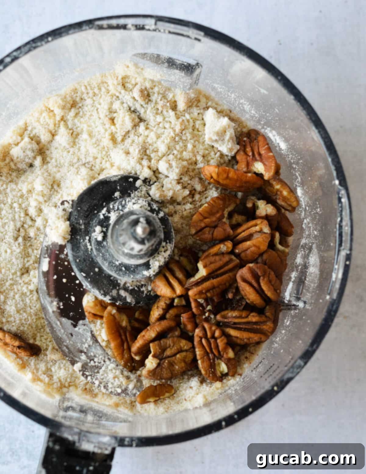 Heavenly Sweet Potato Casserole 8 The flour, butter, and brown sugar mixture with pecans in a food processor, ready to be pulsed into a crumble.