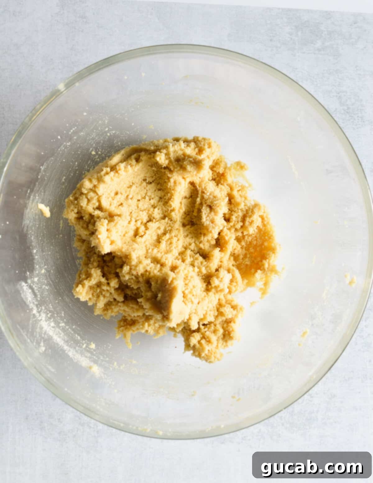a bowl of almond flour cookie dough. 