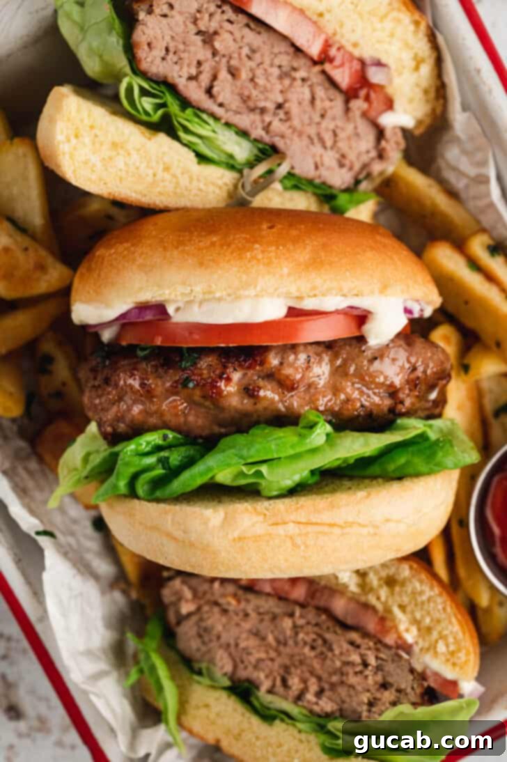 turkey burgers and fries in a tray. 