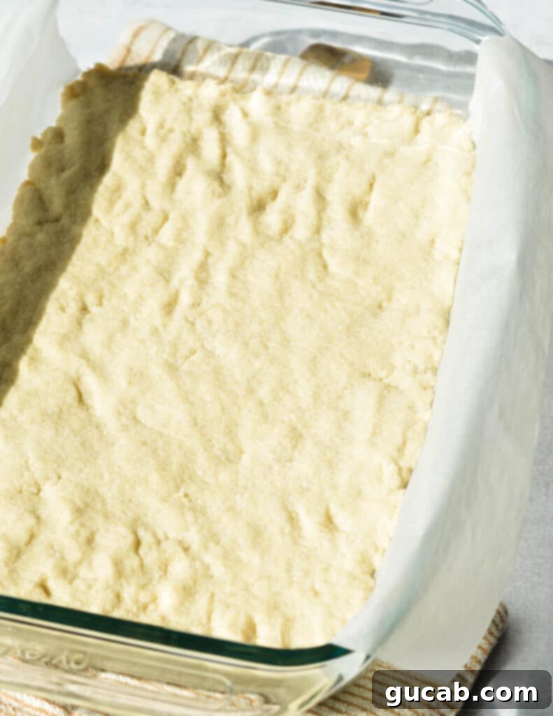 The perfectly baked gluten-free shortbread crust, golden and ready for the key lime filling.