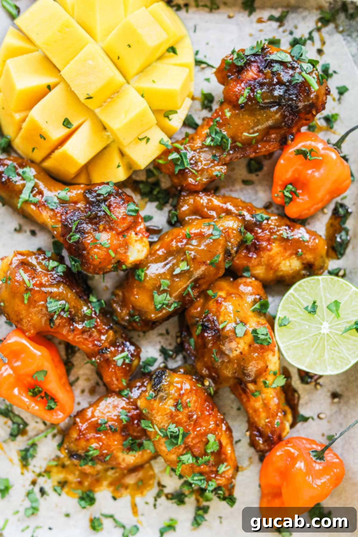 Sun-Kissed Mango Creations 16 Crispy chicken wings generously coated in a sticky mango habanero sauce.