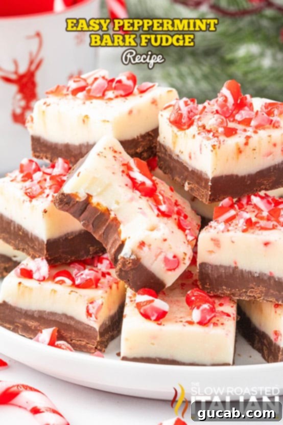 19 Peppermint Desserts to Sweeten Your Holidays 15 stack of peppermint bark fudge squares on a plate.