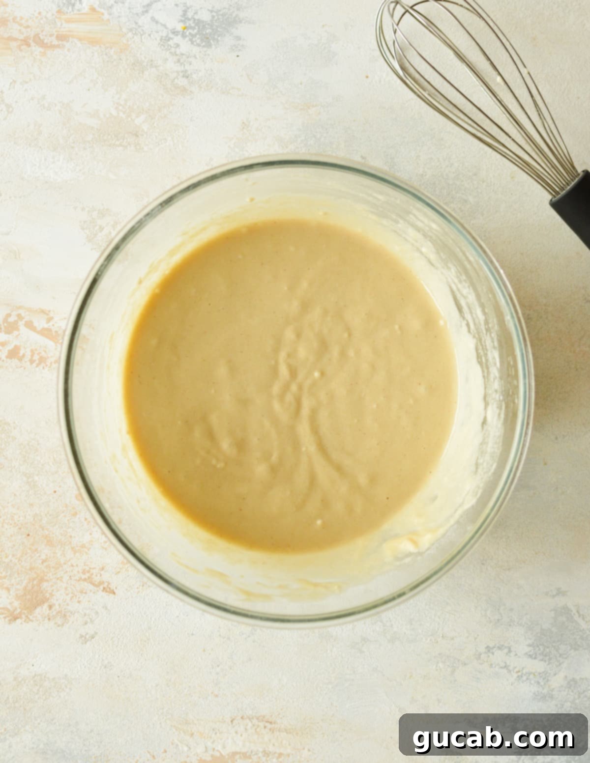 A bowl of smooth, ready-to-cook pancake batter.