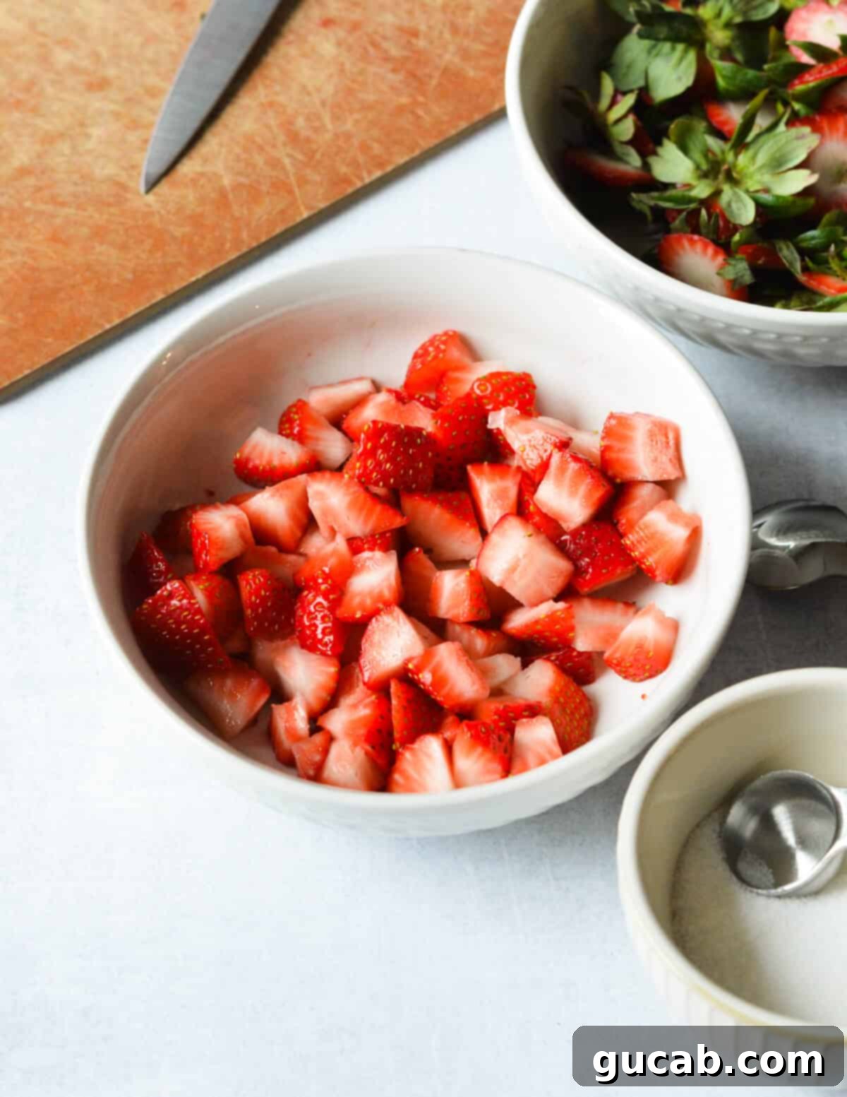Strawberry Passion Zing 10 a bowl of diced strawberries.