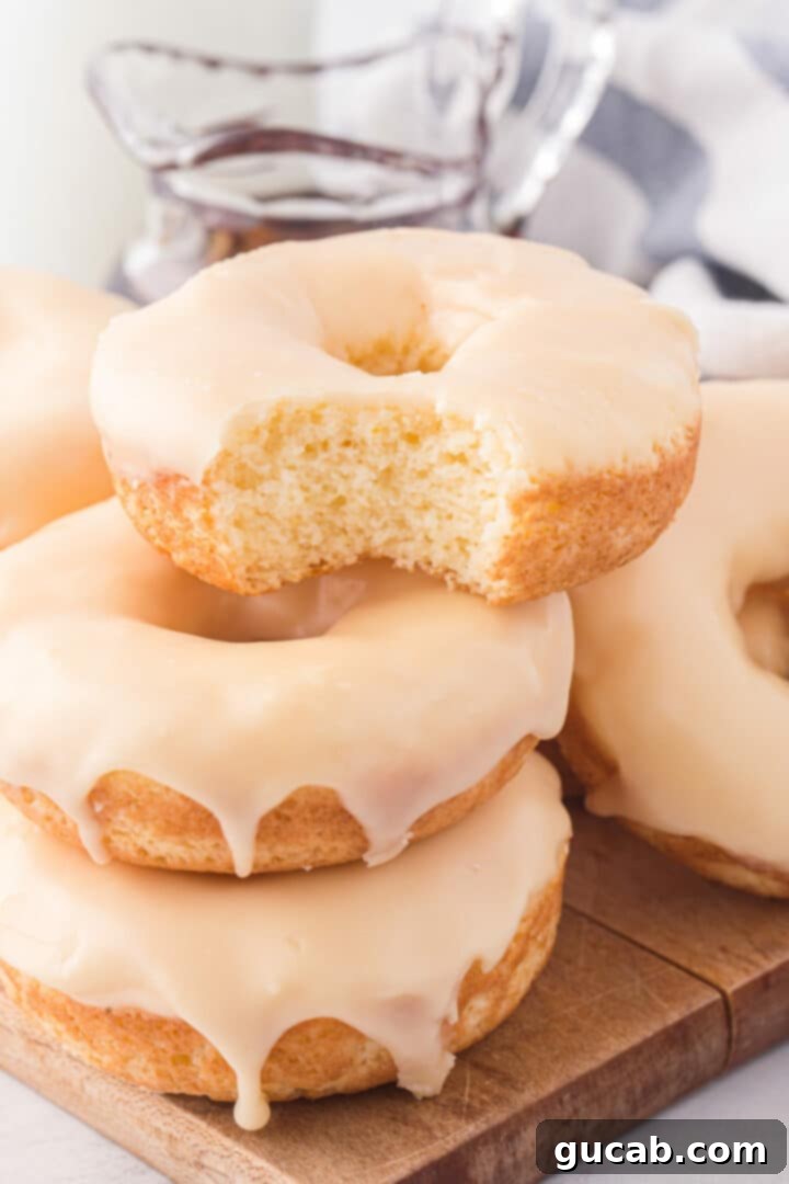 a stack of donuts with maple glaze on them. 