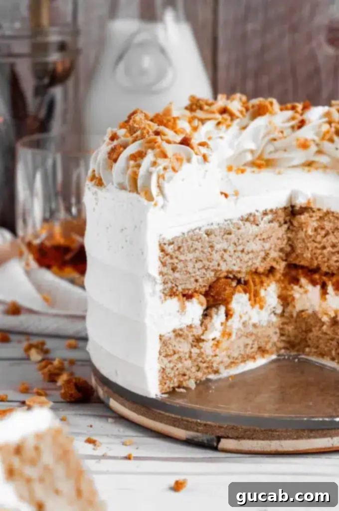 gluten free maple bourbon cake sliced in half. 
