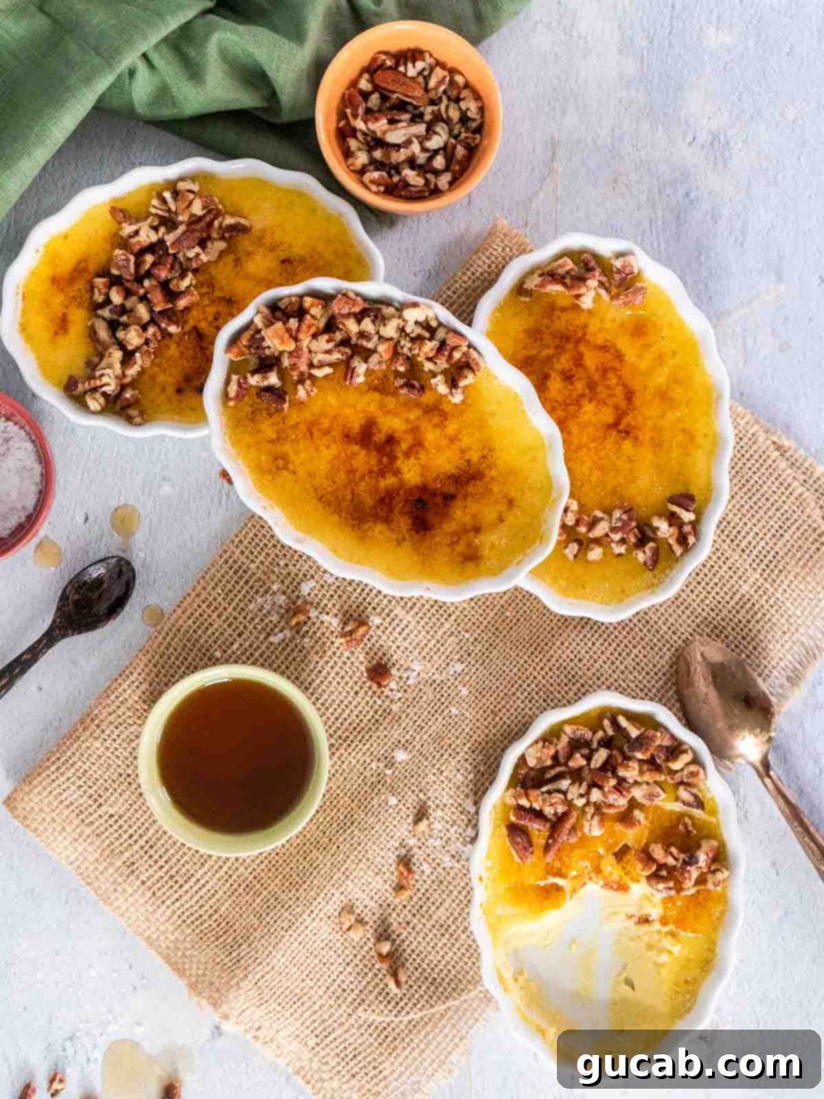 maple creme brulees with pecans on top. 