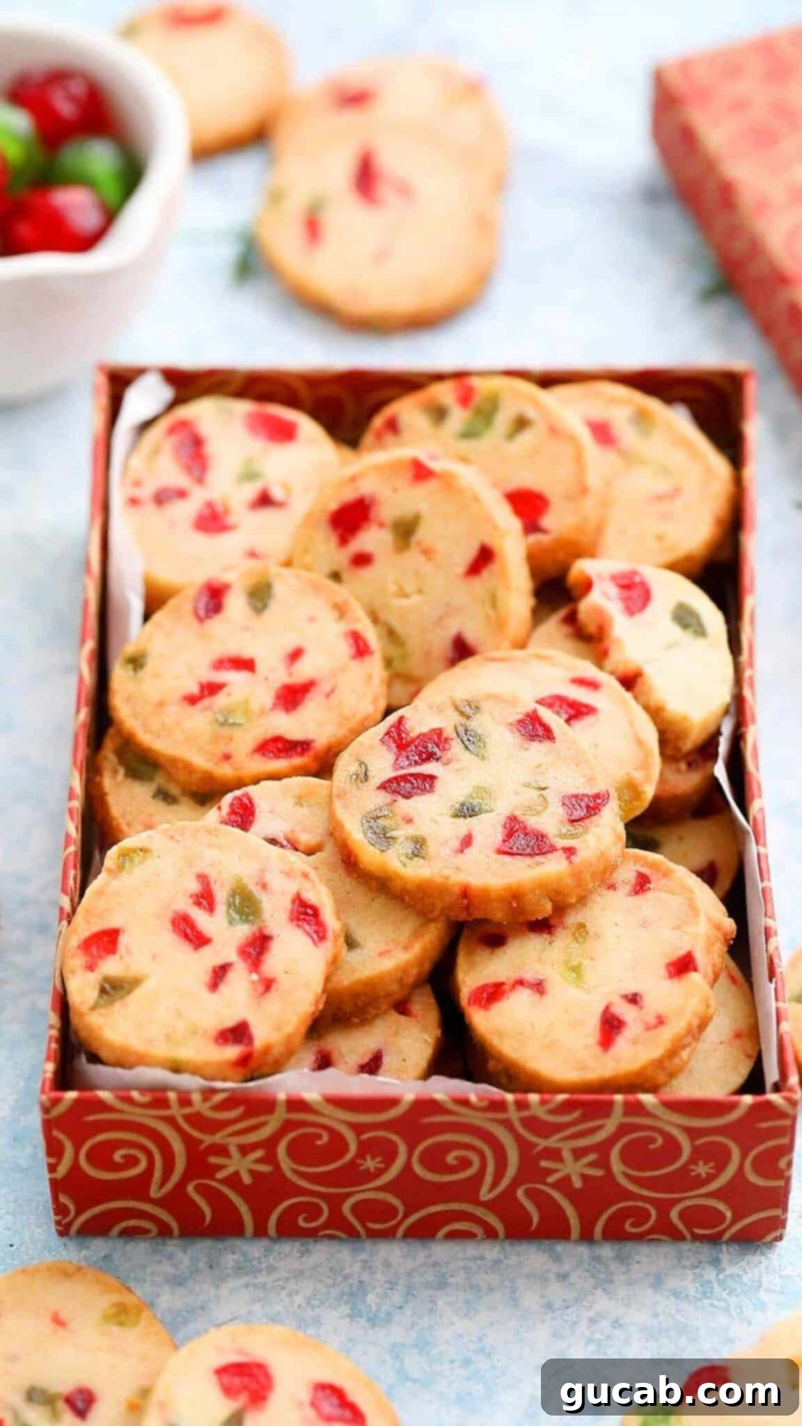 a red container with icebox cookies in it. 