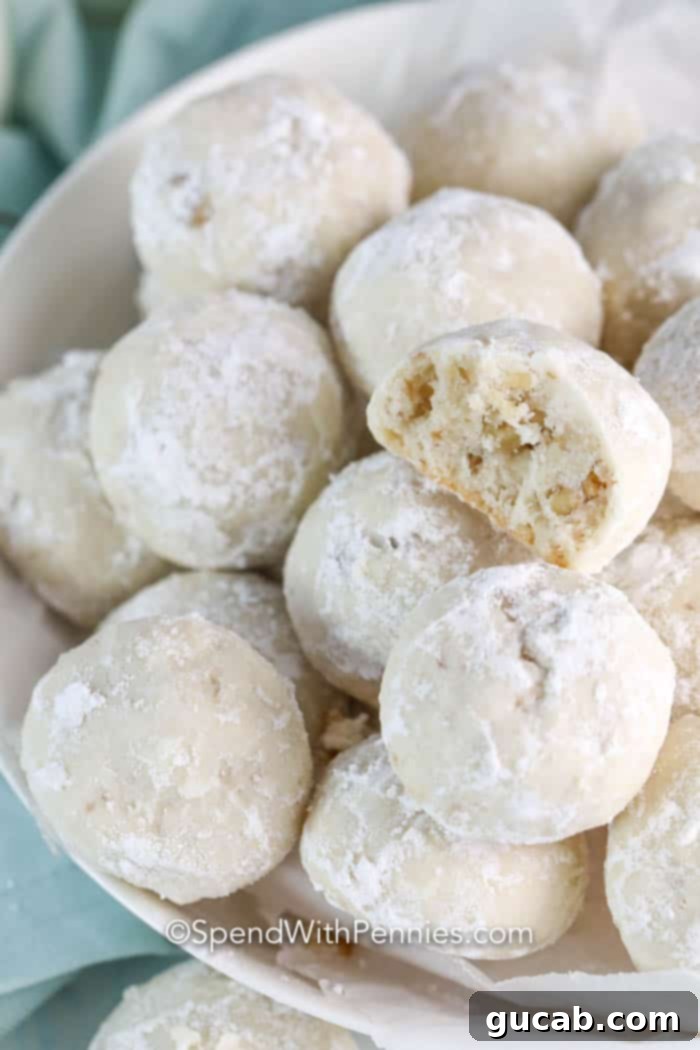 a plate of snowball cookies