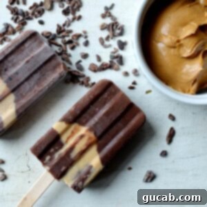 banana chocolate popsicles next to some peanut butter