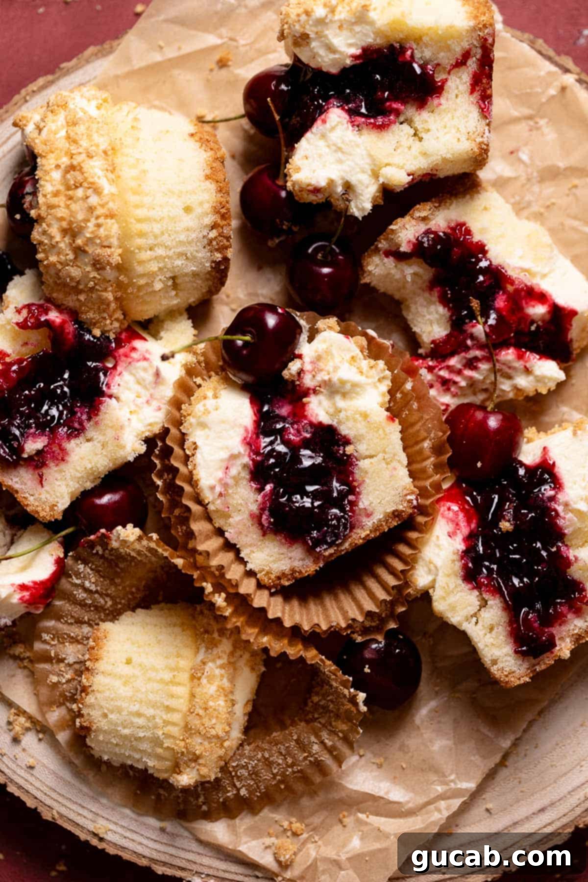cherry cheesecake cupcakes cut in half
