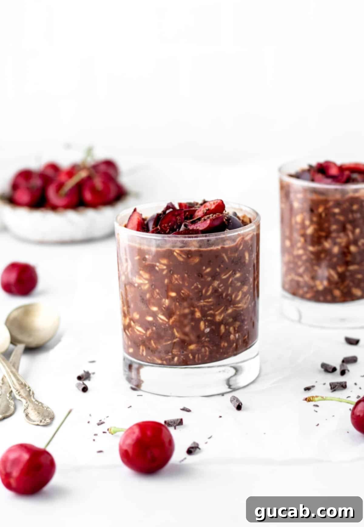 chocolate overnight oats with cherries on top.