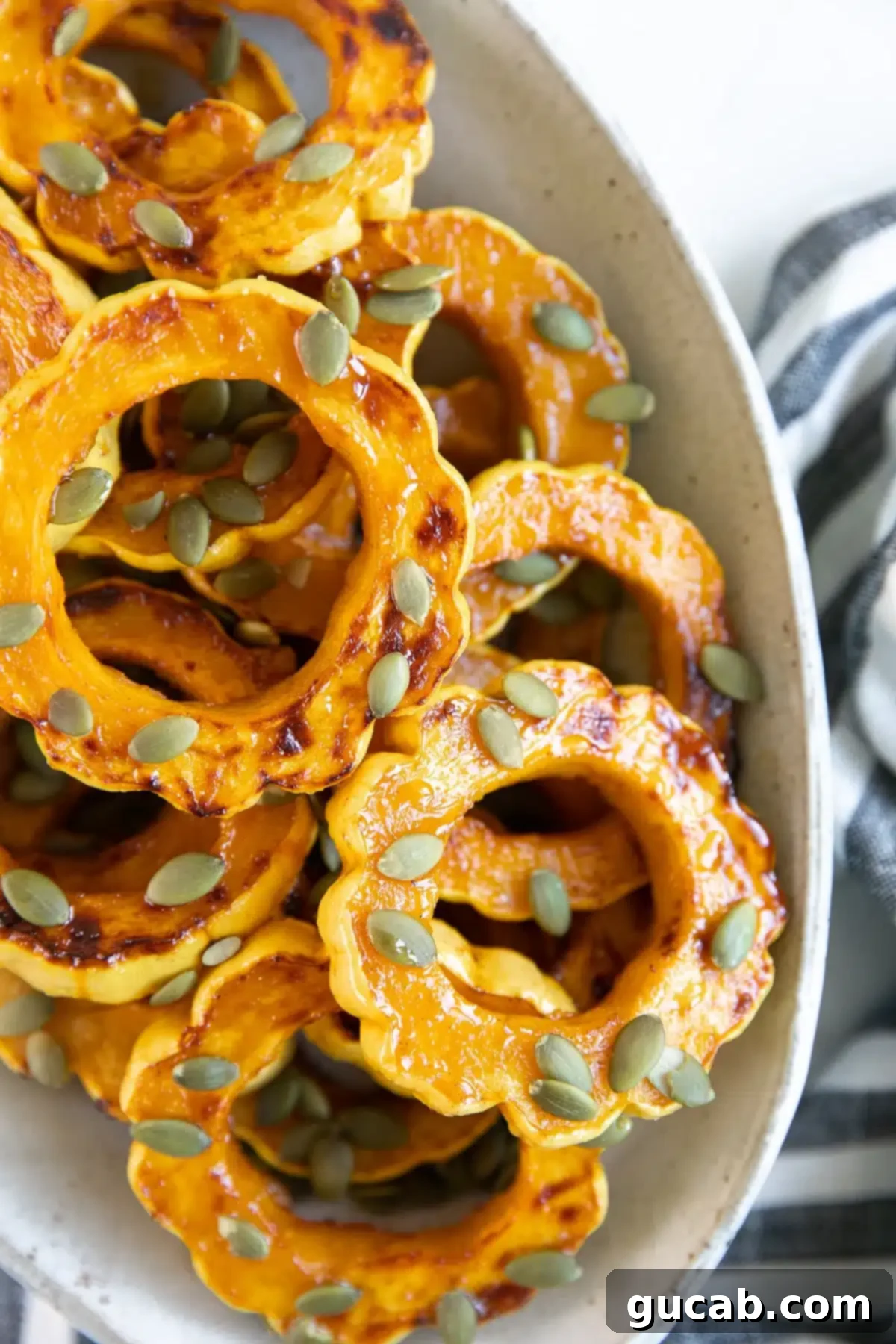 roasted delicata squash slices in a large bowl. 