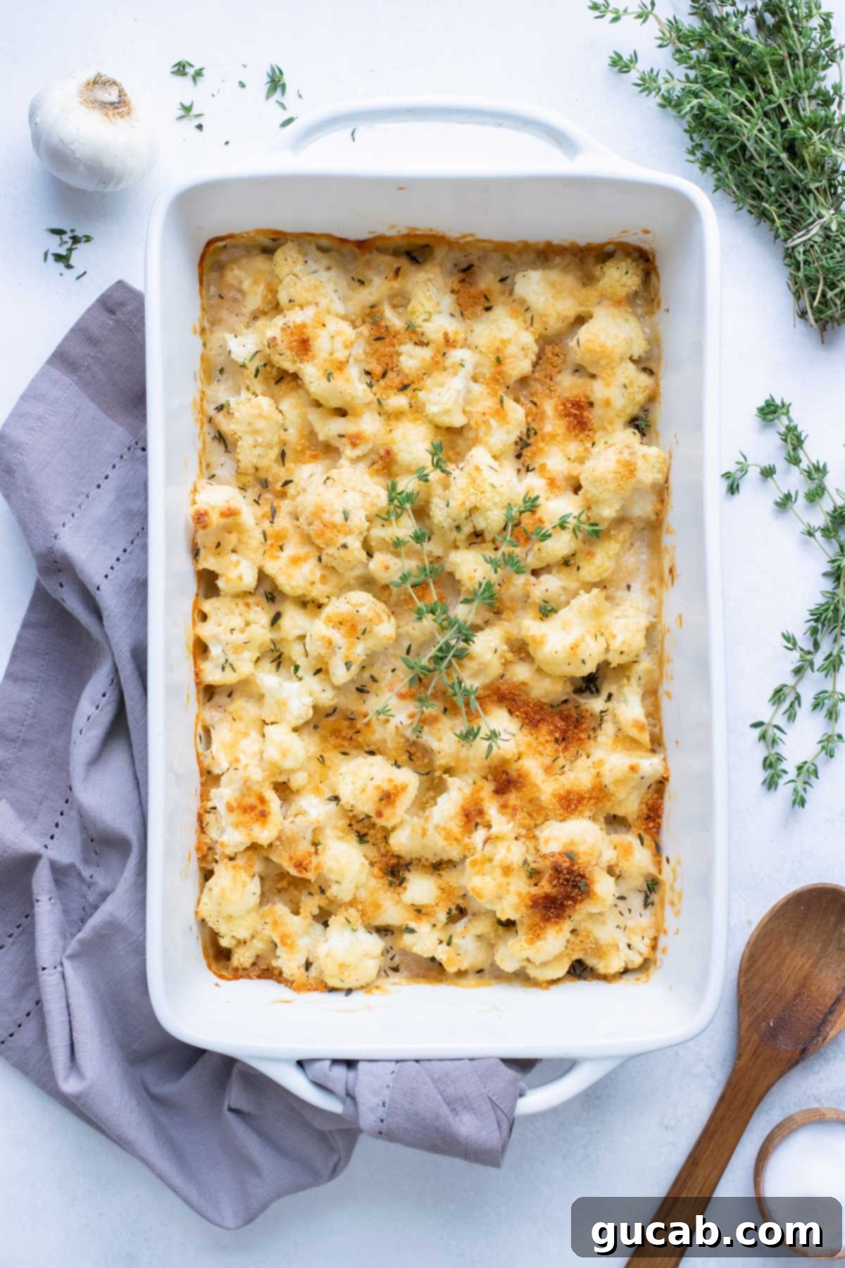 Deliciously Gluten-Free Thanksgiving: 19 Must-Try Recipes 15 A bubbling baking dish of rich cauliflower au gratin, golden and cheesy, ready to be served as an impressive and healthy vegetarian side for Thanksgiving.