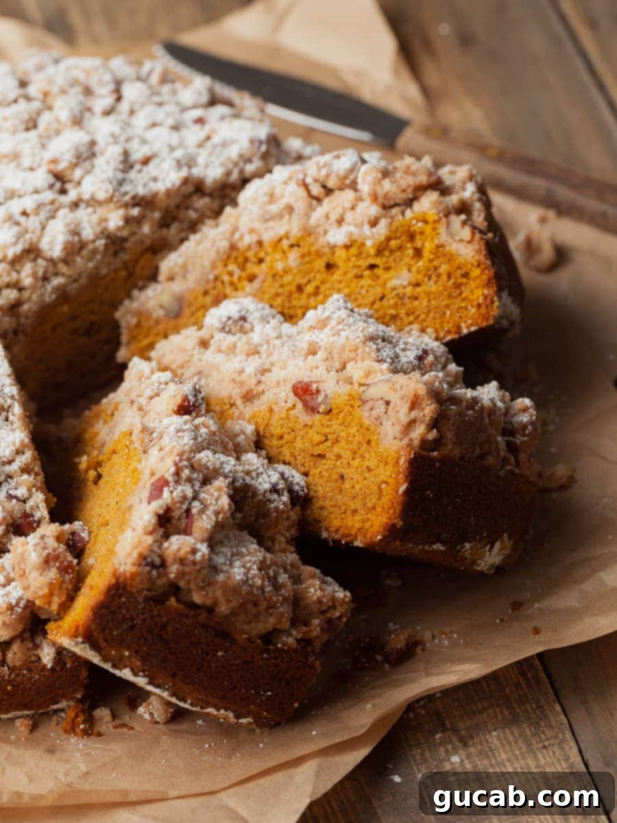 Deliciously Gluten-Free Thanksgiving: 19 Must-Try Recipes 4 Slices of moist gluten-free pumpkin coffee cake with a generous, buttery pecan streusel topping, perfect for an autumn dessert.