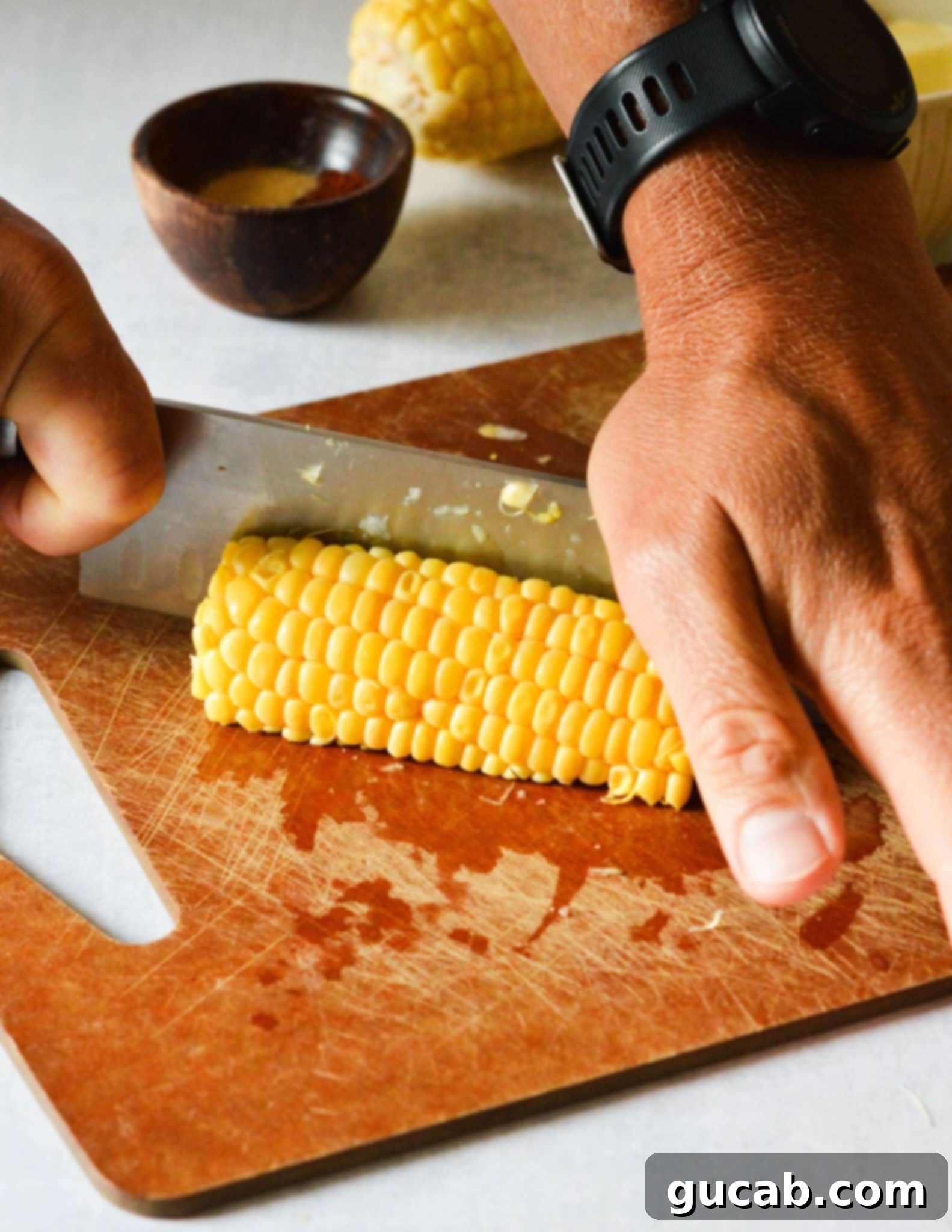 knife cutting corn into ribs.