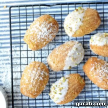 Irresistible Gluten-Free Madeleines 6 Gluten-free madeleines cooling on a rack next to a small bowl of icing, ready for decoration.