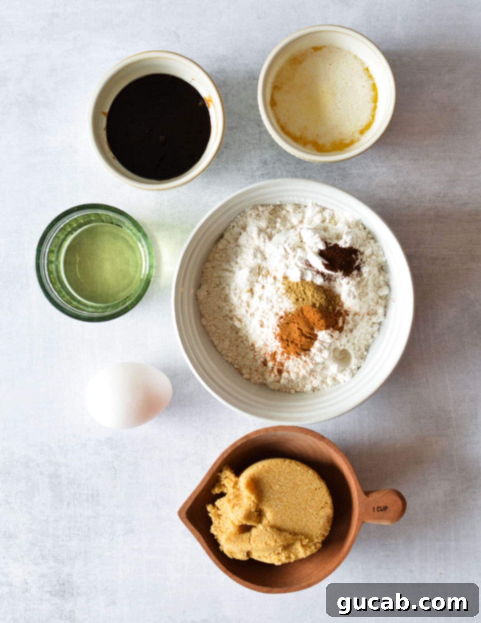 molasses, melted butter, gluten-free flour, spices, vegetable oil, egg, brown sugar. 