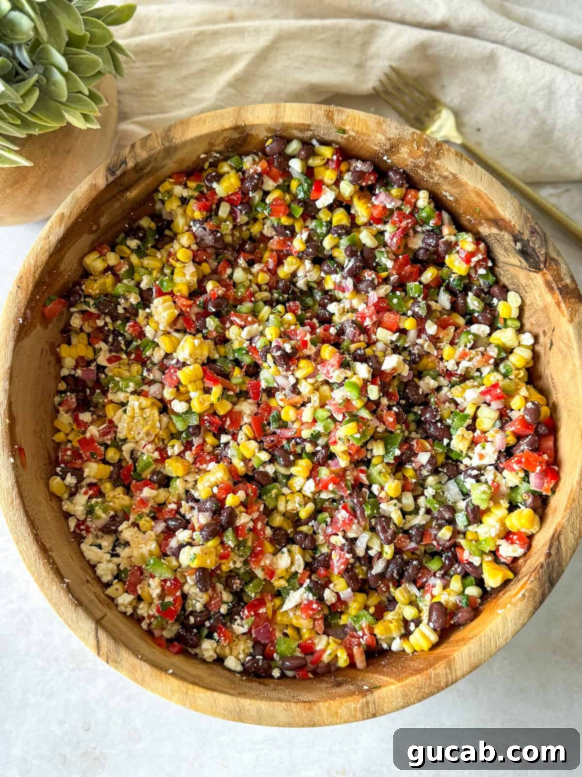 a bowl of black bean and corn dip 
