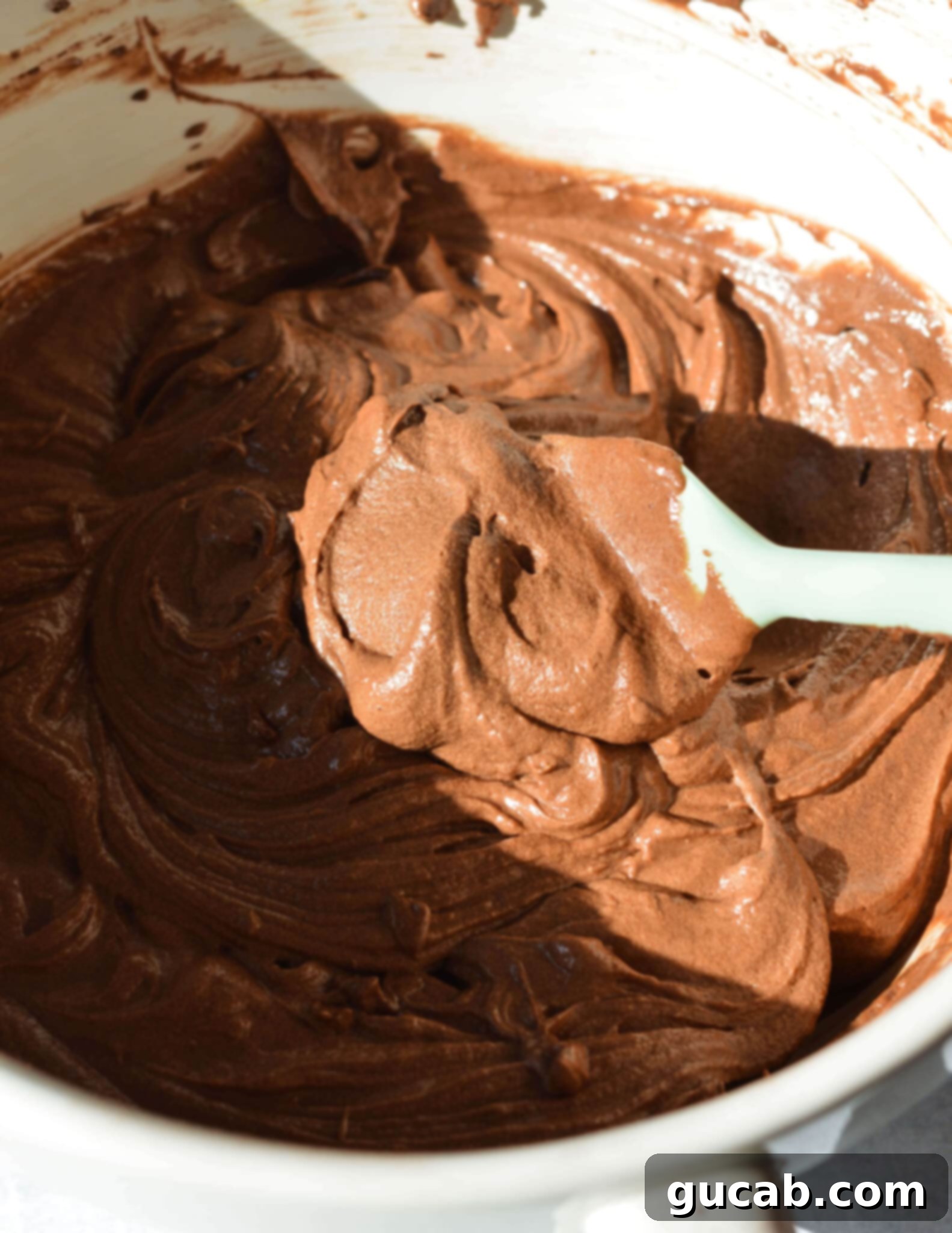 Fluffy Gluten-Free Chocolate Cupcakes 9 Velvety chocolate cake batter in a large mixing bowl, ready for scooping.