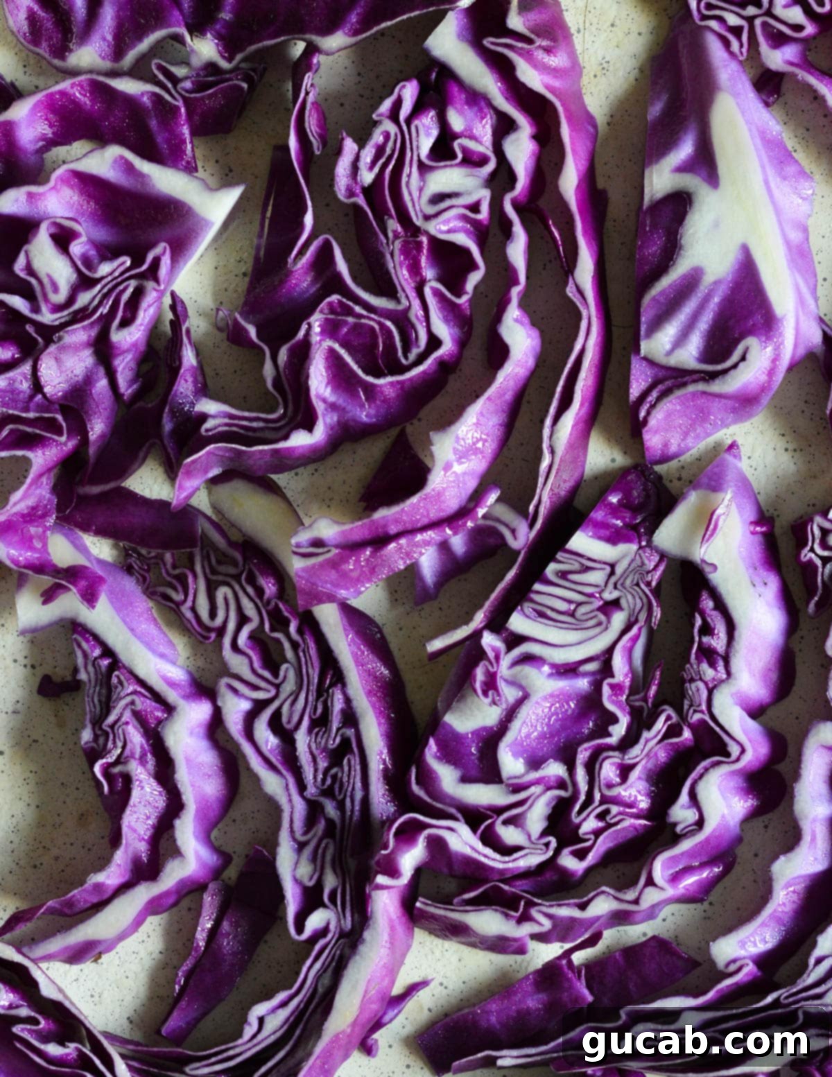 sliced cabbage on a sheet pan. 