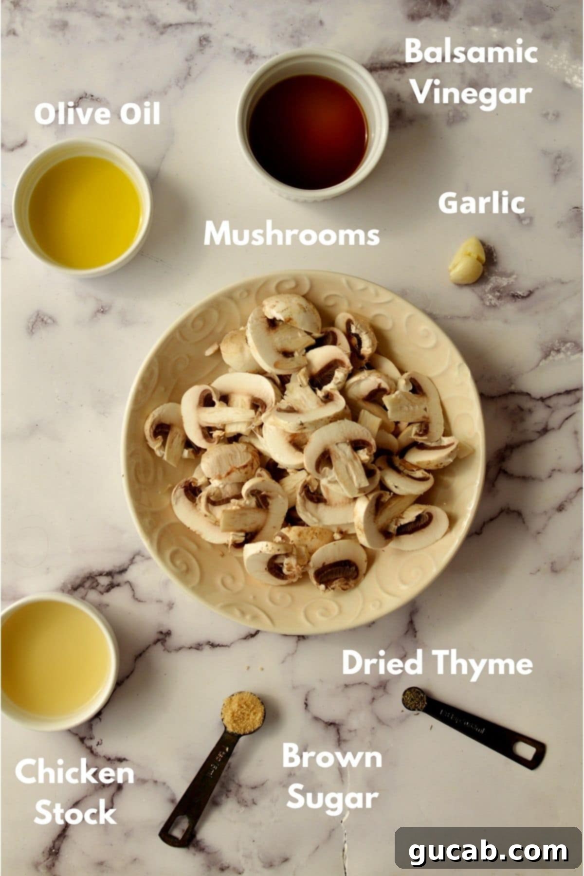 Sweet and Savory Balsamic Glazed Mushrooms 3 All the ingredients for caramelized mushrooms laid out: white button mushrooms, olive oil, balsamic vinegar, chicken stock, garlic, brown sugar, and sea salt.