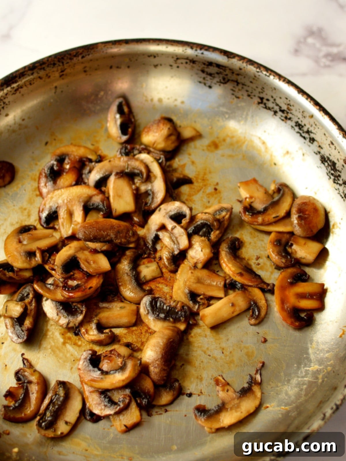 Sweet and Savory Balsamic Glazed Mushrooms 7 A pan full of rich, glossy candied mushrooms ready to be served.