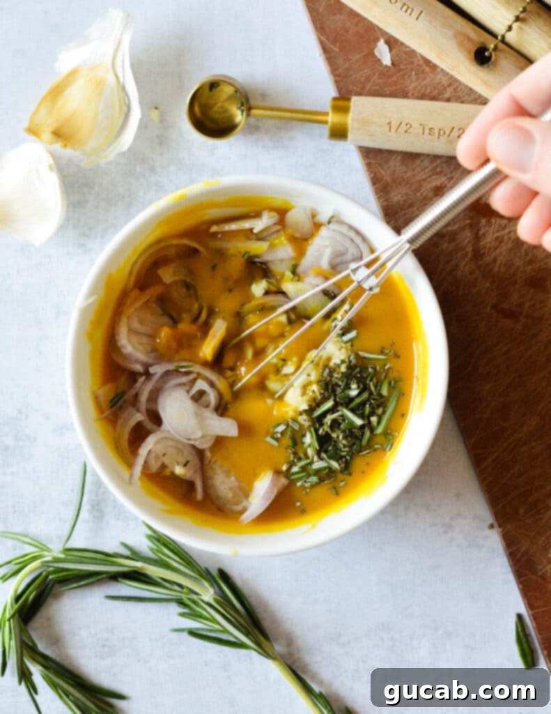 A close-up shot of the mustard sauce ingredients being stirred together in a bowl, showcasing the vibrant colors and textures.