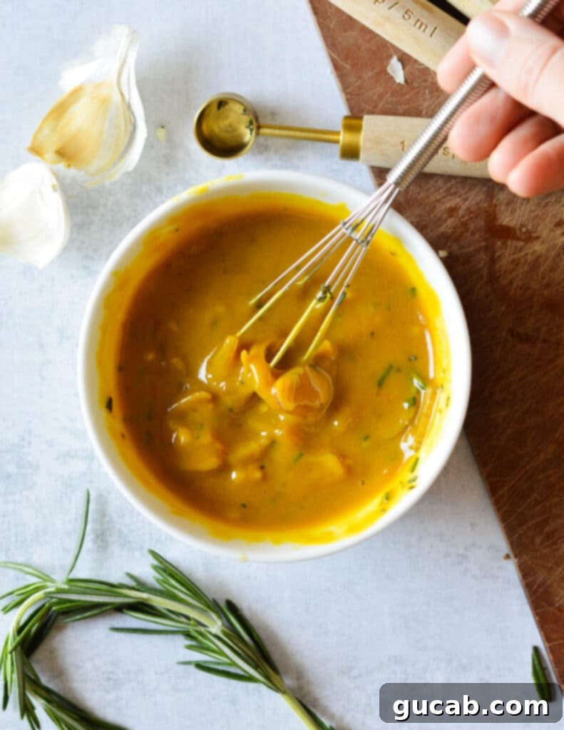 The perfectly mixed sweet and tangy mustard sauce in a bowl, ready to be added to the chicken.