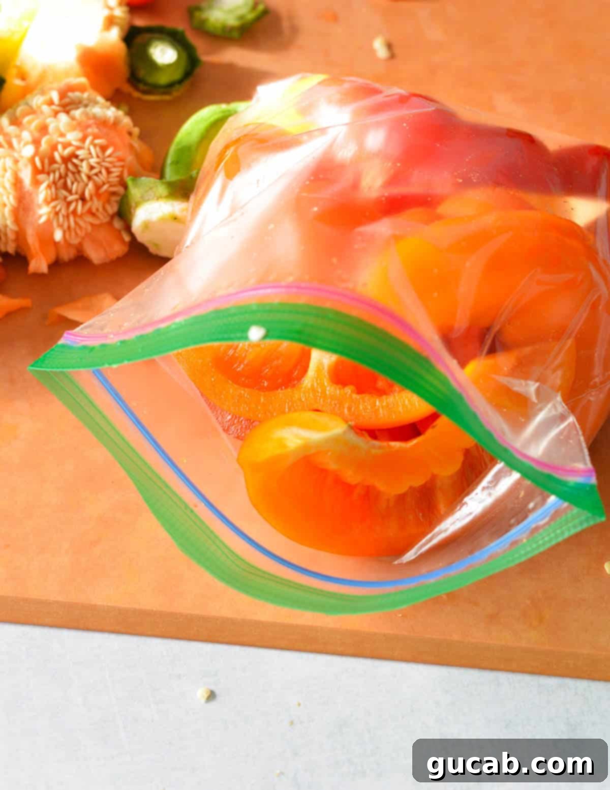 A bag of sliced bell pepper tops, saved for another use.