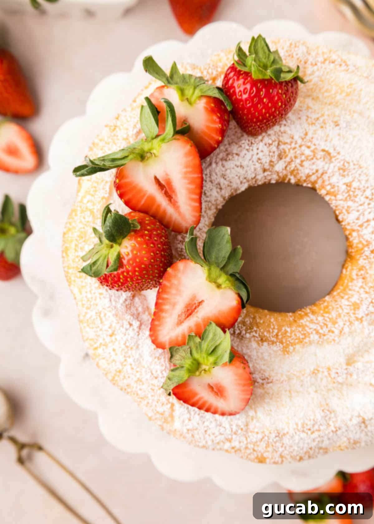 Close-up of a homemade angel food cake showing its perfect light and fluffy texture.