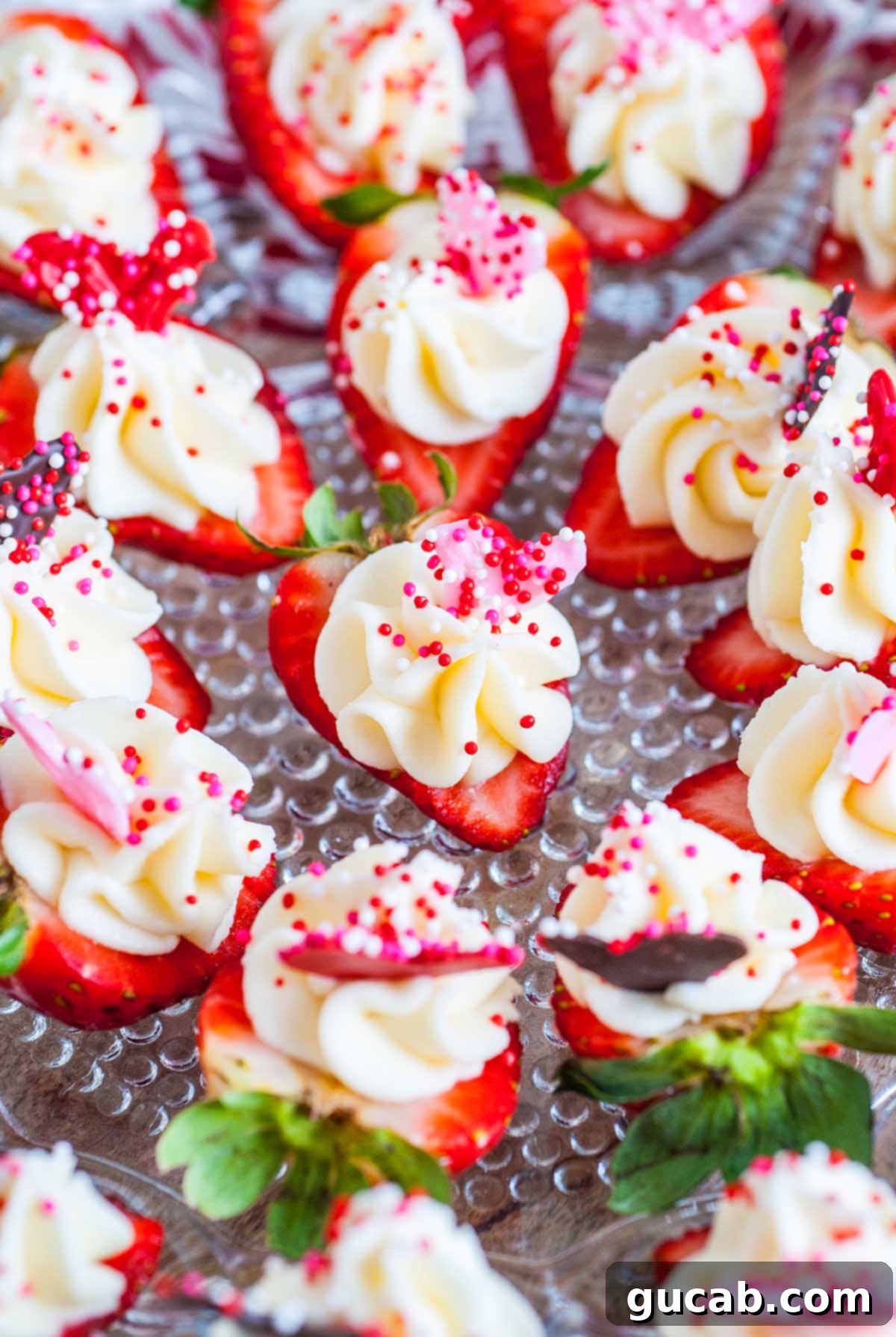 17 Heartwarming Valentine's Day Desserts 10 mascarpone stuffed strawberries with festive Valentine's sprinkles on top