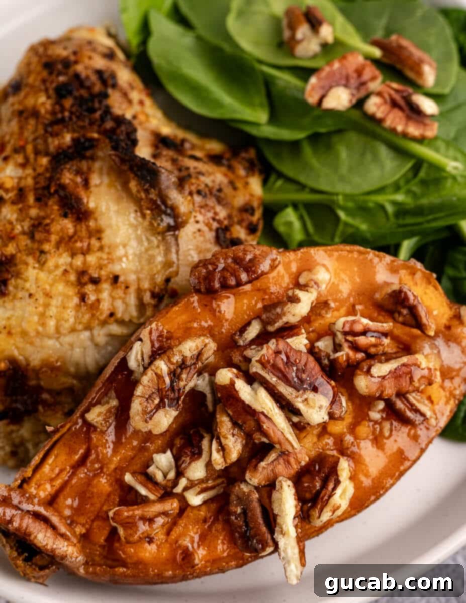 baked sweet potato with cinnamon maple butter and pecans. 