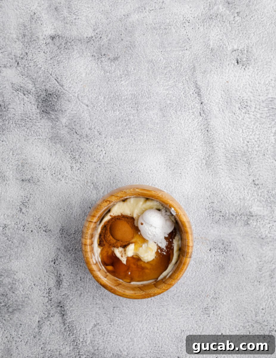 softened butter, powdered sugar, maple syrup, and cinnamon in a small bowl. 
