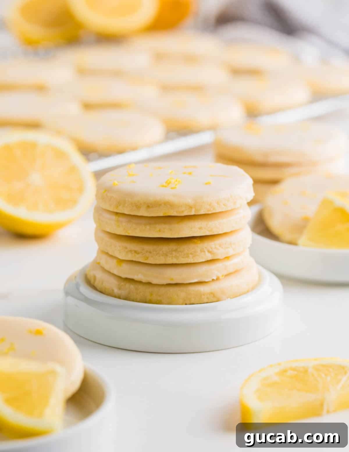 Sweet and Zesty Lemon Cookies 4 a stack of lemon sugar cookies.