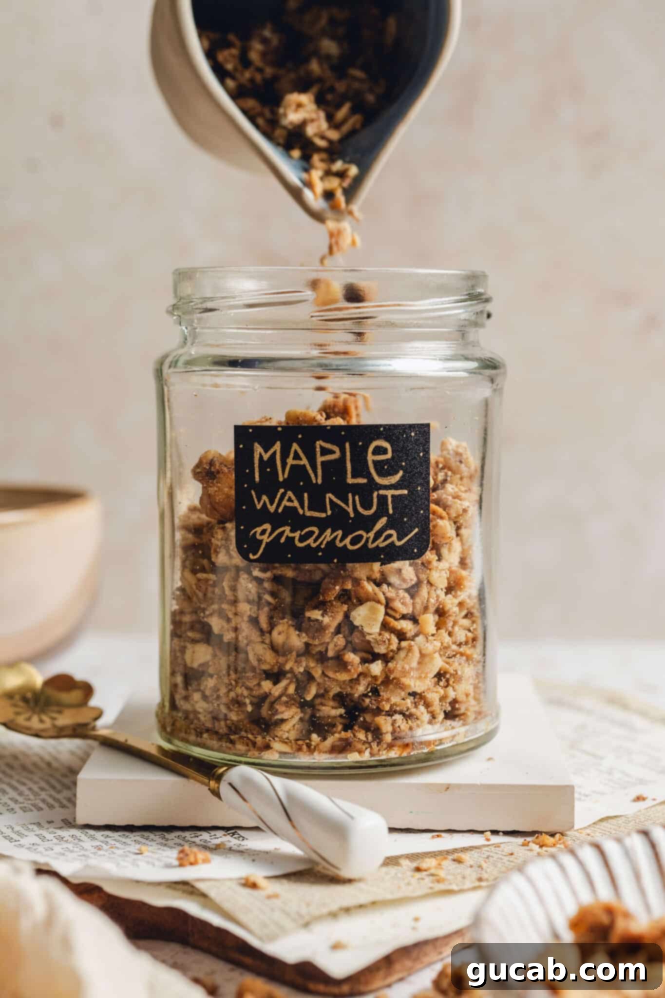 a jar full of maple walnut granola. 