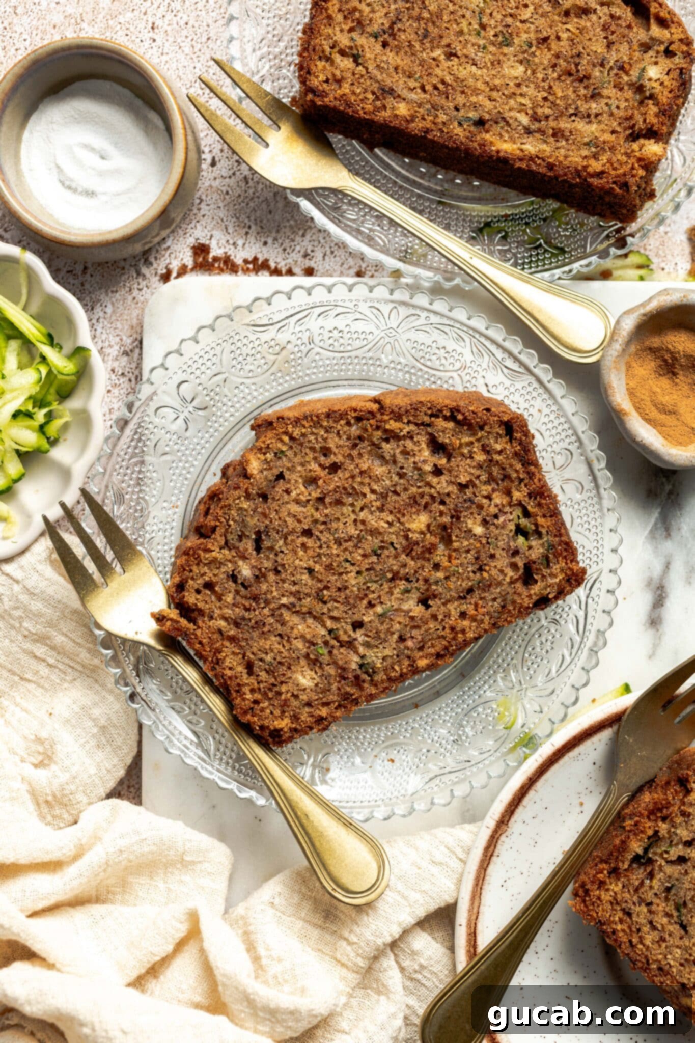 Zucchini Bread Perfection 2 slice of zucchini bread on a plate